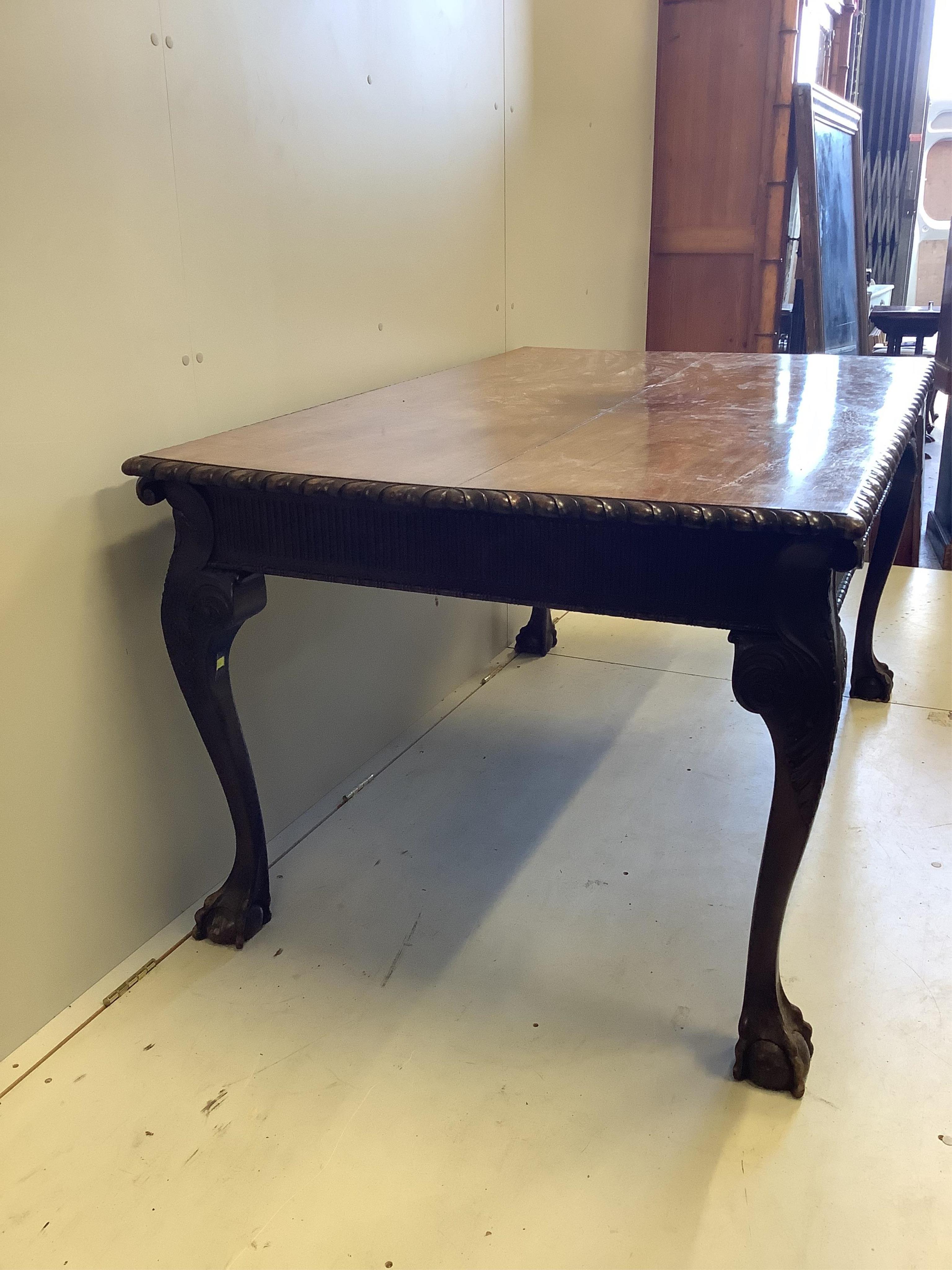 A Chippendale Revival rectangular mahogany table, width 152cm, depth 96cm, height 78cm and four chairs. Condition - fair